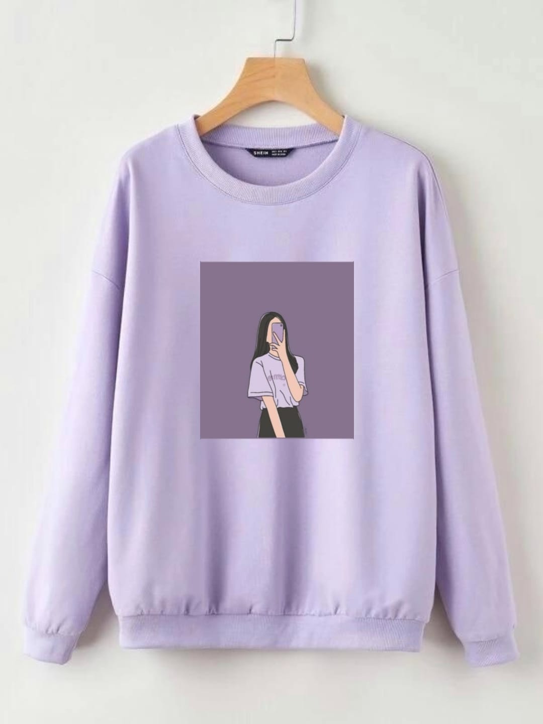 LILAC SWEATSHIRT PURPLE BACKGROUND GIRL