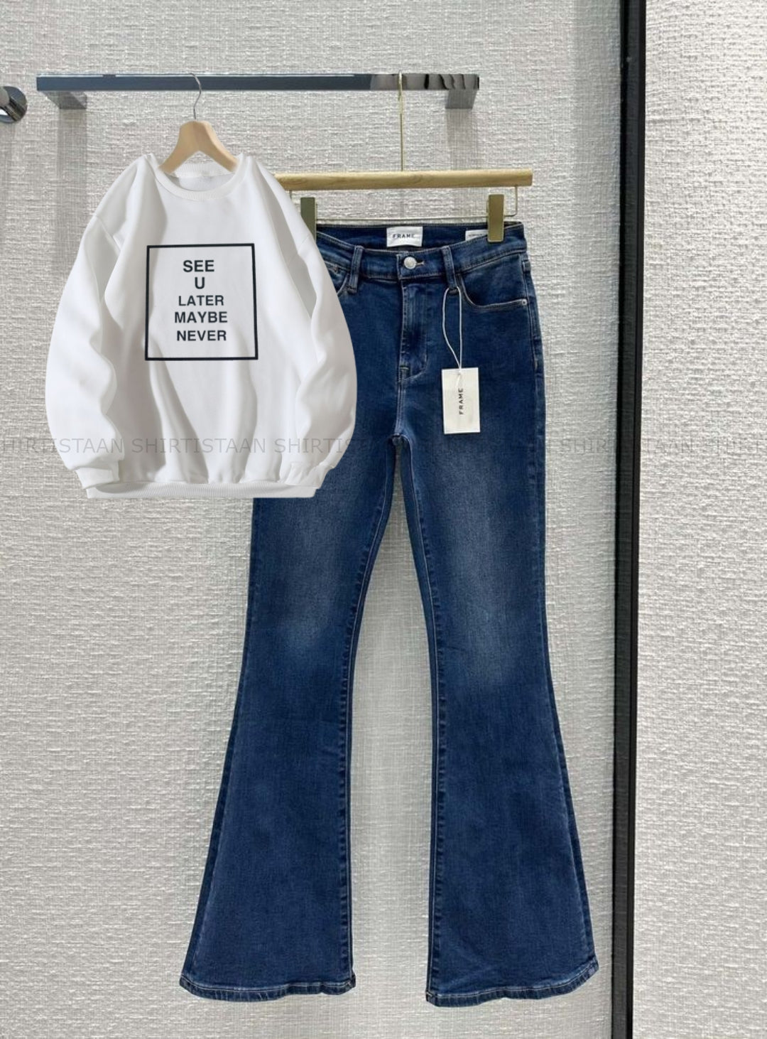 MID BLUE BELL BOTTOM JEANS WITH WHITE SWEATSHIRT SEE YOU LATER