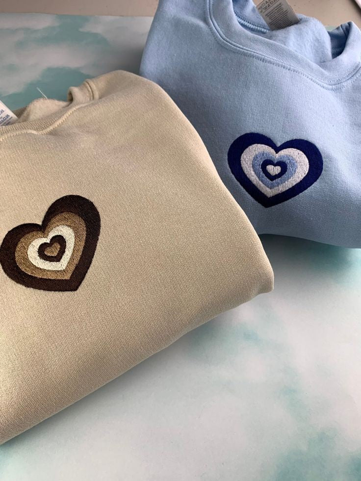 BEIGE AND SKY BLUE NESTED HEART SWEATSHIRT